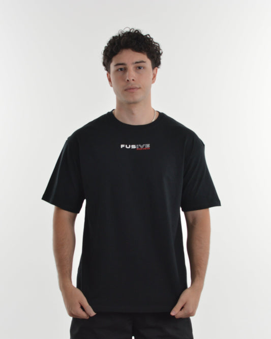 Person wearing a black t-shirt with a logo on a white background