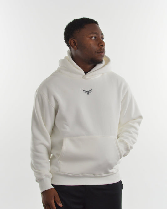 Person wearing a white hoodie with a logo on a white background